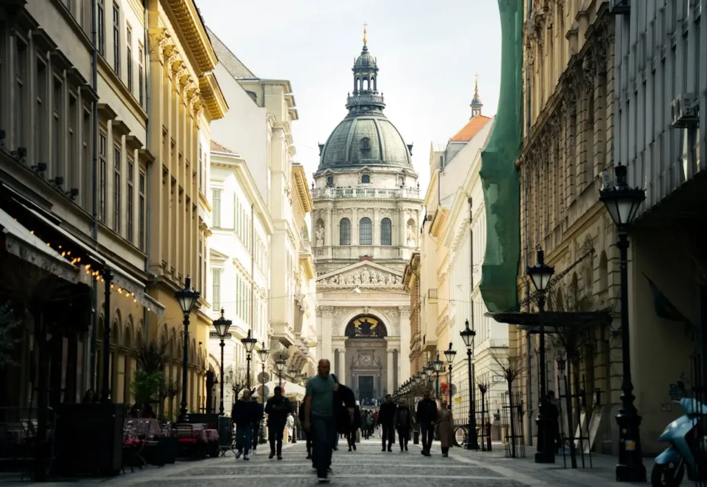 Passersby on the Pedestrian Mall in Front of Saint Stephens Basilica in Budapest